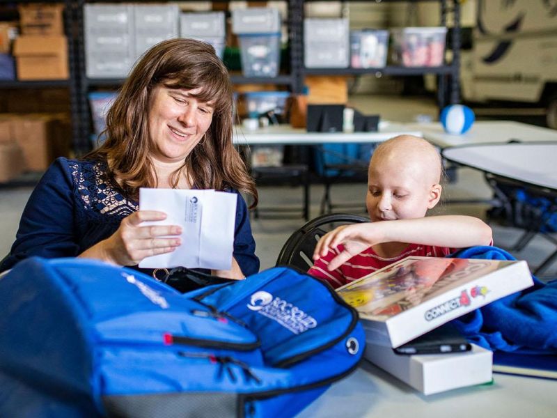 Mom and child cancer patient with Ready Bag