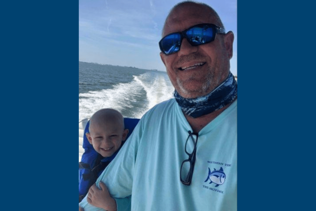 Ted Quinn with his grandson Cameron on a boating adventure!