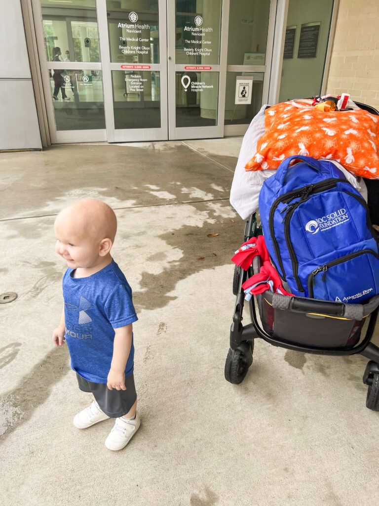 Pediatric cancer patient leaving the hospital with his Roc Solid Ready bag.