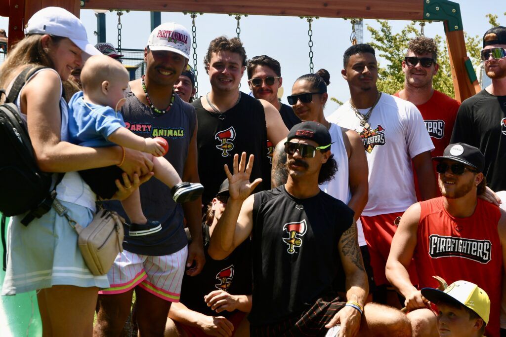 Banana Ball players build playset for boy fighting cancer