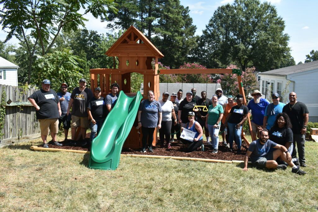 The Amazon volunteer team that built a playset for Owen in Richmond!